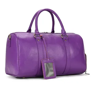 Purple genuine leather travel duffel bag detail, premium cowhide luggage handbag for men.