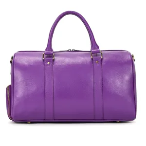 Premium purple leather travel duffel bag for men, spacious gym luggage with sturdy handle.