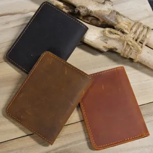 Detailed closeup of genuine crazy horse leather card holders in three classic retro colors.