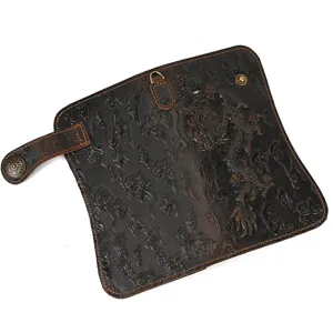Vintage embossed genuine leather long wallet clutch detail view with dragon pattern.
