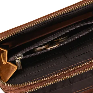 Detail view of men's genuine leather wallet interior with card slots and zipper coin pocket.