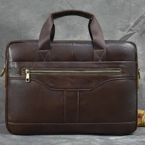 Dark brown leather briefcase detail, business laptop bag handle and metal zipper accent.