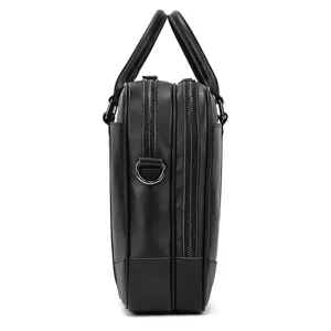 Side view detail of black leather business briefcase, showing dual zippers and sturdy handle.