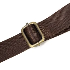Replacement adjustable bag strap with durable metal buckle in brown color for daily use.