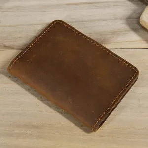Vintage genuine leather card holder minimalist brown wallet for men and women daily use.