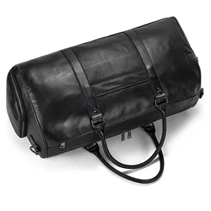 Vue détaillée du sac de voyage en cuir noir de qualité supérieure avec poignées robustes.