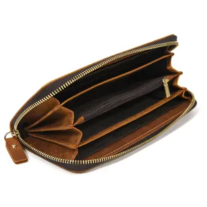 Heren vintage leer lange rits portemonnee detail met kaartsleuven en ruime vakken.