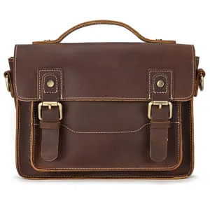Vintage brown leather messenger bag for men and women with top handle and dual buckles.