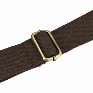 Brown canvas bag strap replacement with antique bronze adjustable metal buckle accessory.