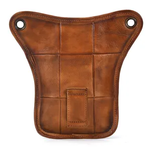 Detailed view of retro genuine leather tactical waist bag with metallic eyelets and belt loop.