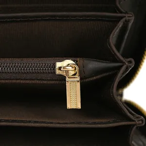 Heren vintage echt leren lange portemonnee binnendetails, kaartsleuven en ritsvakje.