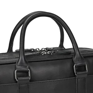 Close-up detail view of black leather briefcase handle and metal zippers, professional photography.