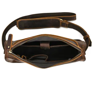 Vintage crazy horse leather men's messenger bag interior detail view with multiple pockets.