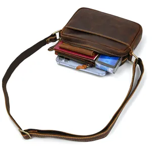 Vintage crazy horse leather men shoulder bag detail, multi-compartment crossbody bag storage.