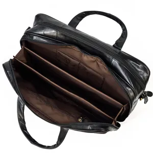 Borsa portadocumenti ventiquattrore in vera pelle nera dettaglio interno con scomparti multipli.