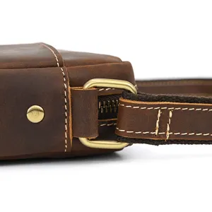 Close-up of vintage crazy horse leather men shoulder bag strap connector and metal buckle.
