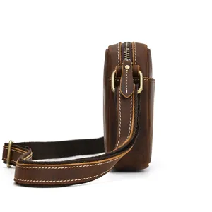 Vintage brown leather shoulder bag side detail, premium crazy horse leather design.