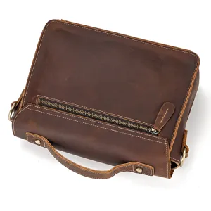 Detail view of brown crazy horse leather men handbag retro vintage shoulder crossbody bag