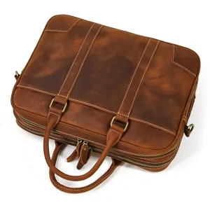Brown leather briefcase detail view, business laptop bag close-up leather texture