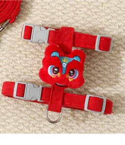 Red Chinese lion dance pet harness detail shot, comfortable vest strap for cats and small dogs.