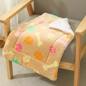 Thick fleece pet blanket with cute paw prints, warm winter mat for dogs and cats, cozy sleeping bed.