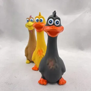 Latex squeaky dog toy detail showing three funny animal chew toys for pets and puppies.