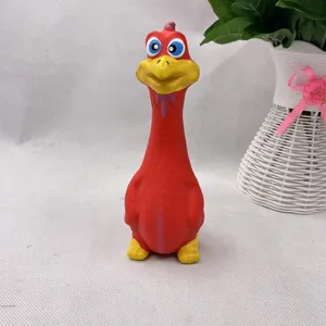 Close-up detail of the cute red and yellow latex squeaky toy for dogs and pets playing.