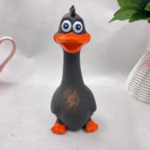 Latex squeaker dog toy detail shot showcasing the funny black long-necked duck design.