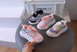 Detailed view of breathable colorful mesh children sneakers in various vibrant colors.