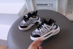 Detailed view of breathable mesh toddler sneakers with chunky sole and elastic laces