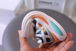 Close-up of highly flexible sole on breathable children's walking sneakers for boys
