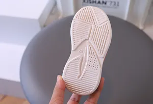 Macro view of anti-slip rubber sole for children's sneakers showing grip texture