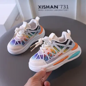 Breathable mesh toddler sneakers with vibrant rainbow colors and comfortable sole.