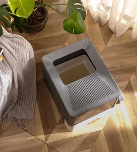 Arenero cerrado para gatos con entrada superior, gran baño gris de plástico para mascotas.