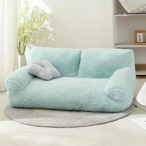 Cozy mint green plush pet sofa detail, soft winter warm cat bed with cute flower pillow.