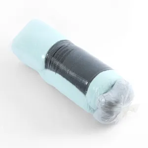 Detailed view of rolled plush pet bed in protective packaging, soft light blue winter warmer.