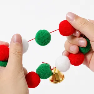 Christmas pet collar with colorful pom-poms and small golden bell for dogs and cats.