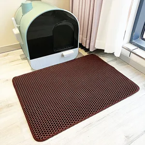 Tapis de litiere chat antiderapant EVA double couche detail, design nid d'abeille durable.