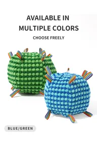 Detailed view of textured pet dog toy ball with colorful loops, bite-resistant chew toy.