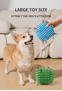 Detailed view of plush pet dog interactive ball toy with textured surface and colorful loops.