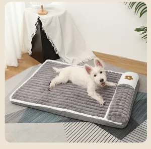 Comfortable plush pet dog mat with soft pillow and flower design, washable floor bed for pets.