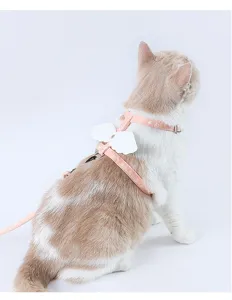 Cute pink cat harness and leash set with white angel wings for small dogs and cats detail.