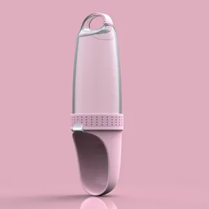 Portable outdoor pet water bottle for dogs and cats, travel pet feeder cup in pink color.