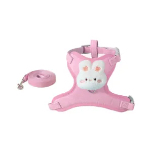 Pink pet harness and leash set with cute bunny plush decoration, escape proof for cats.