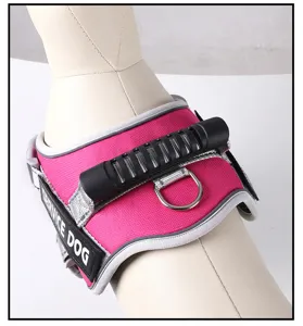 Pink reflective pet dog chest harness detail showing sturdy handle and metal ring for safety.