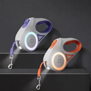 Laise pour chien rétractable LED avec lumière changeante à 6 couleurs et lampe torche.