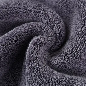 Microfiber car towel detail shot showcasing ultra-thick plush texture and high-density grey fleece fibers.