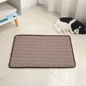 Cooling pet mat detail view, brown circular embossed cooling pad for cats and dogs summer use.