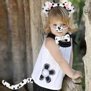 Dalmatian dog costume detail view featuring plush ear headband and cute animal tail.