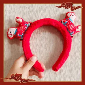 2026 New Year Chinese zodiac horse plush headband, festive red cute hair hoop for women kids.